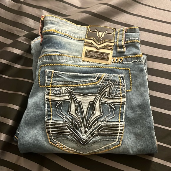 Blue denim boot-cut jeans size 38/30